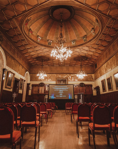 The hall set up for a presentation.