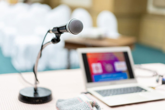 A laptop and microphone