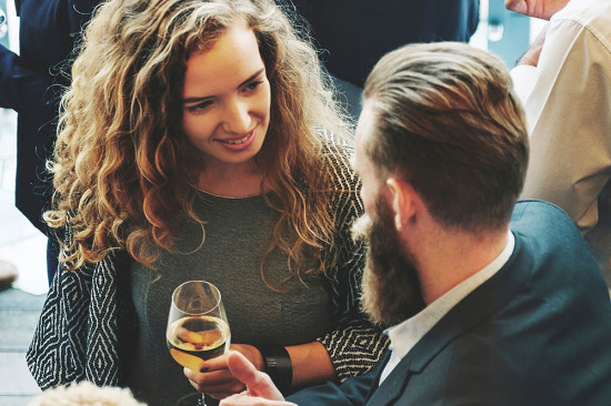 A man and woman talking